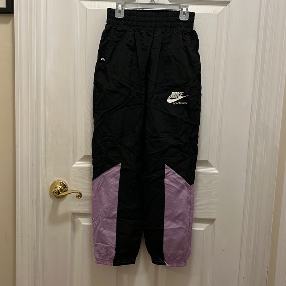Nike girls nylon joggers. Worn twice in great condition.